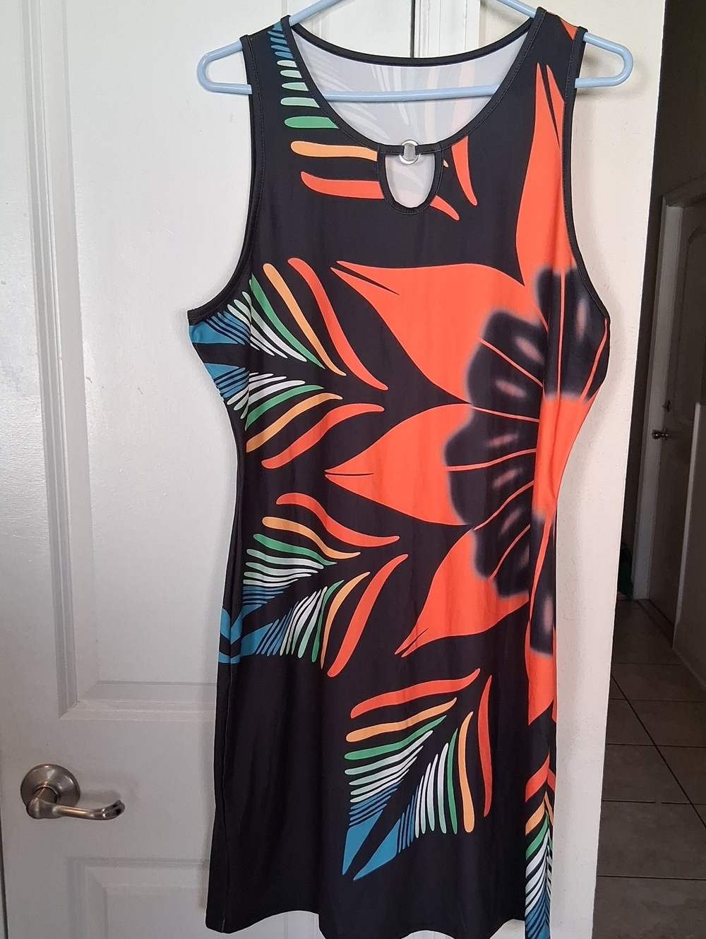 H:  Sleeveless Black Dress with Orange Floral Print